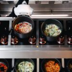 Robô cozinheiro com IA vence prêmio internacional de robótica