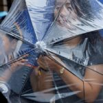 Chuva forte atinge Pequim durante passagem do tufão Dolphin